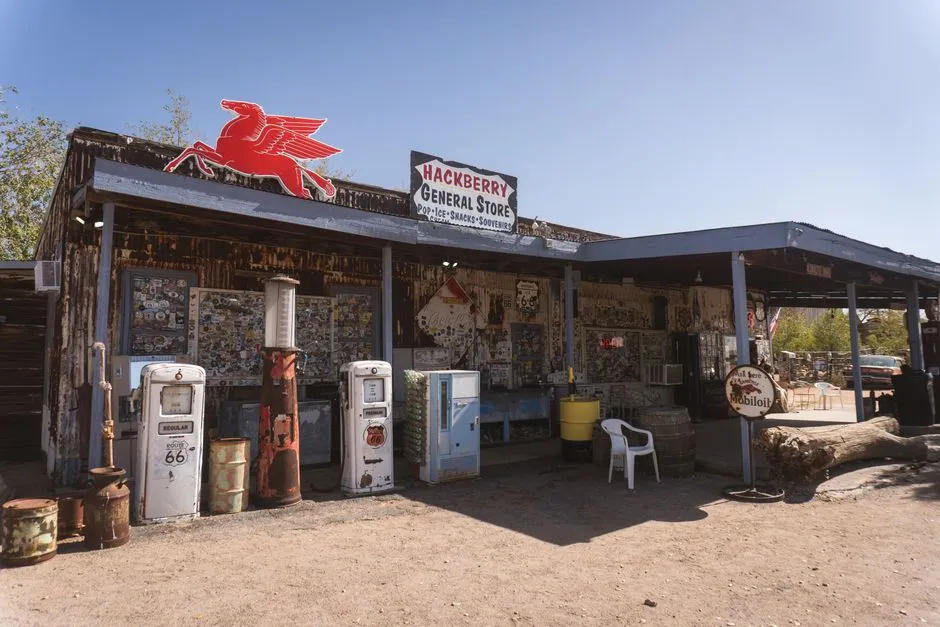 Rustic wooden storefront with hand-painted signage evocative of the American West